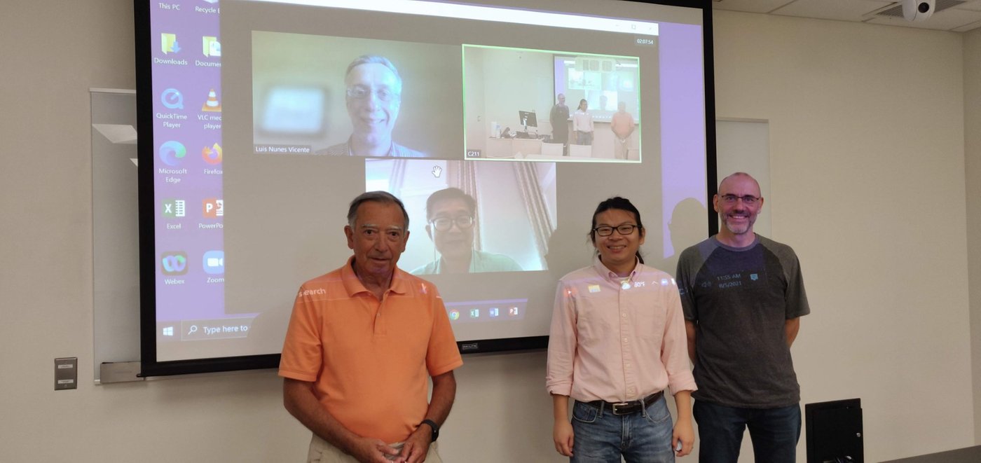 Michael with Jorge Nocedal and Andreas Wächter after his 2021 Ph.D. defense, with Luís Nunes Vicente and Peter Tang joining by video